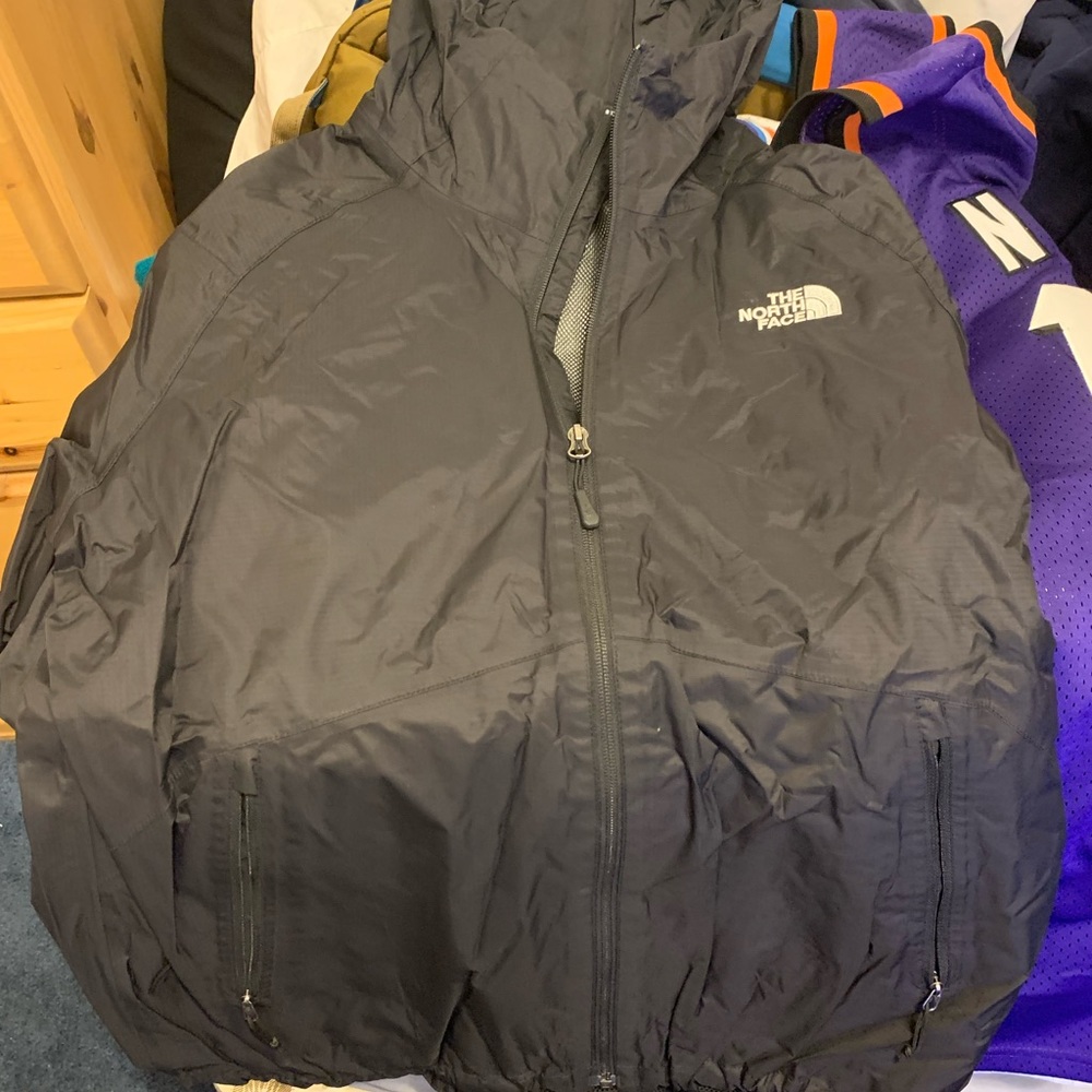 North Face black rain coat.
